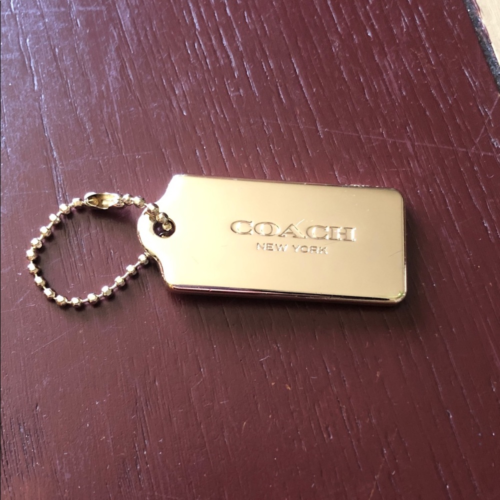 Coach Gold Toned Bag Tag